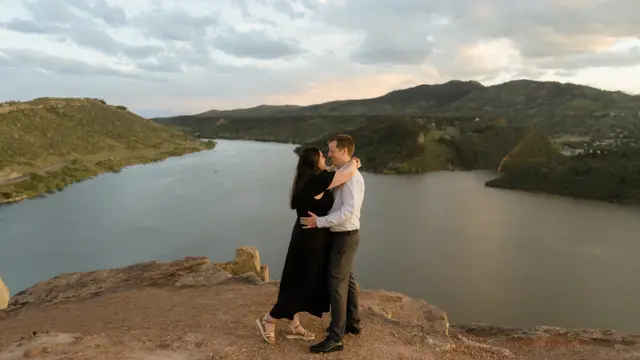 Holding each other on the cliff above the long reach of the reservoir