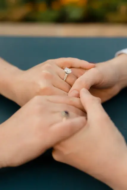 A close-up of the engagement ring