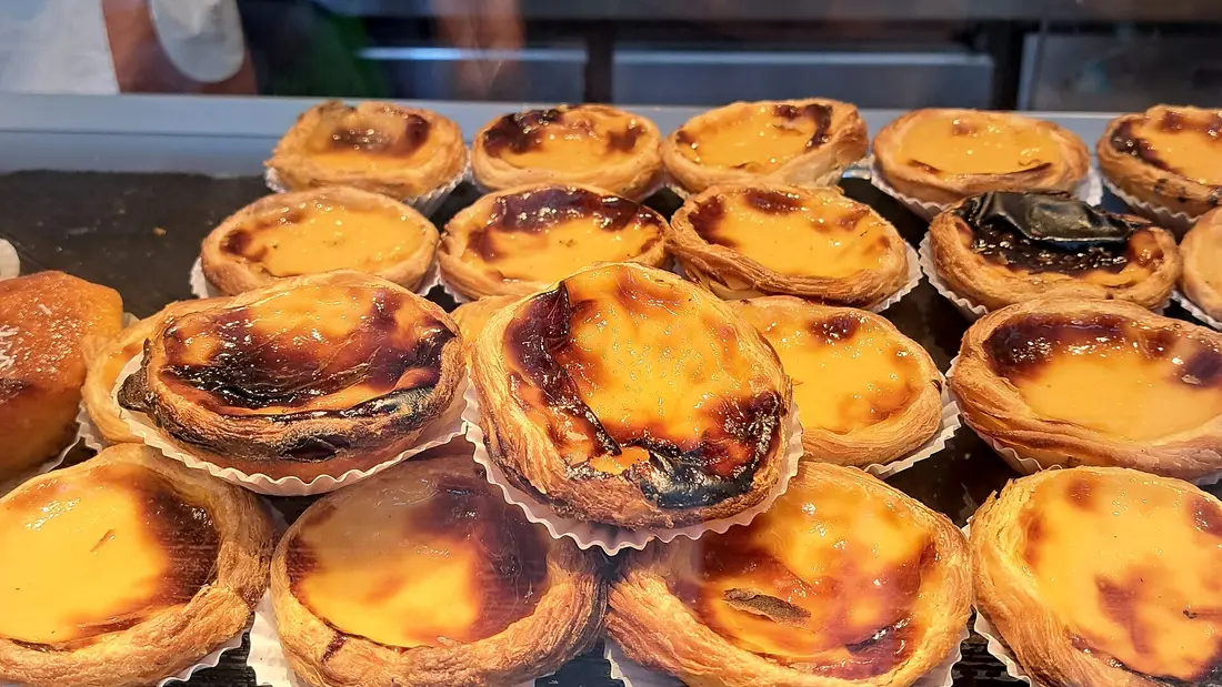 A tray of pastéis de nata fresh from the oven in Porto